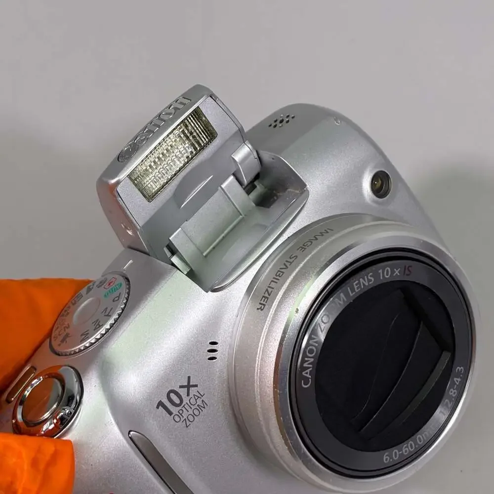 Canon PowerShot SX110 IS 9.0MP Digital Camera, Silver FOR PARTS